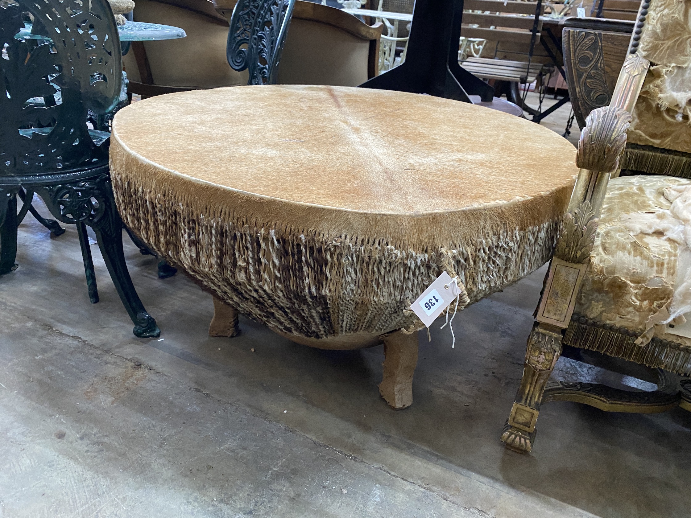 A large African circular hide drum, diameter 90cm, height 53cm